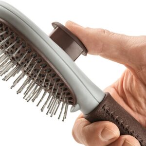 Escova desembaraçante Hunter com limpeza automática para cães, prática e ergonômica