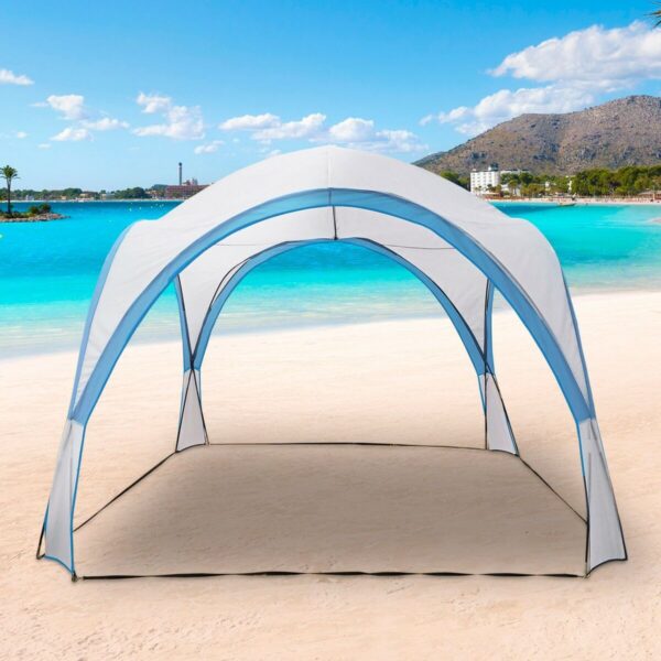 Toldo de Praia Aktive Azul – Sombra, Conforto e Facilidade na Montagem Toldo de praia azul Aktive montado na areia com vista para o mar e céu limpo