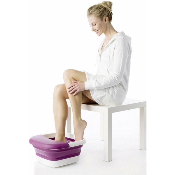 Hidromassageador de Pés Beurer FB30 – Relaxamento para Idosos Mulher idosa relaxando com hidromassageador de pés Beurer FB30 dobrável