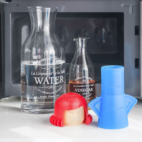 Fuming Mum InnovaGoods – Limpeza a Vapor para Micro-ondas Limpador de micro-ondas Fuming Mum InnovaGoods colocado no interior de um micro-ondas, pronto para gerar vapor de limpeza